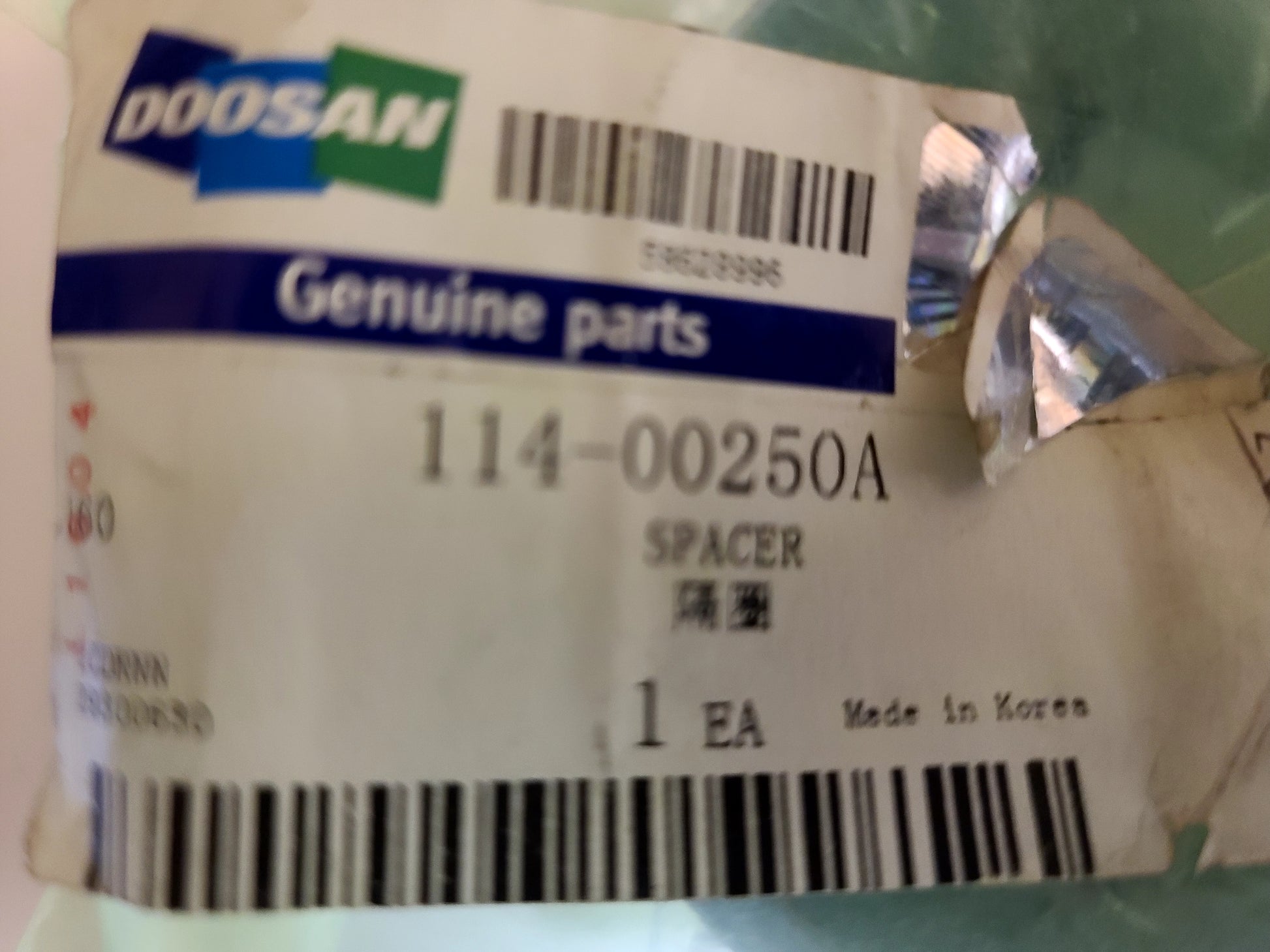Doosan spacer part packaging with label and barcode