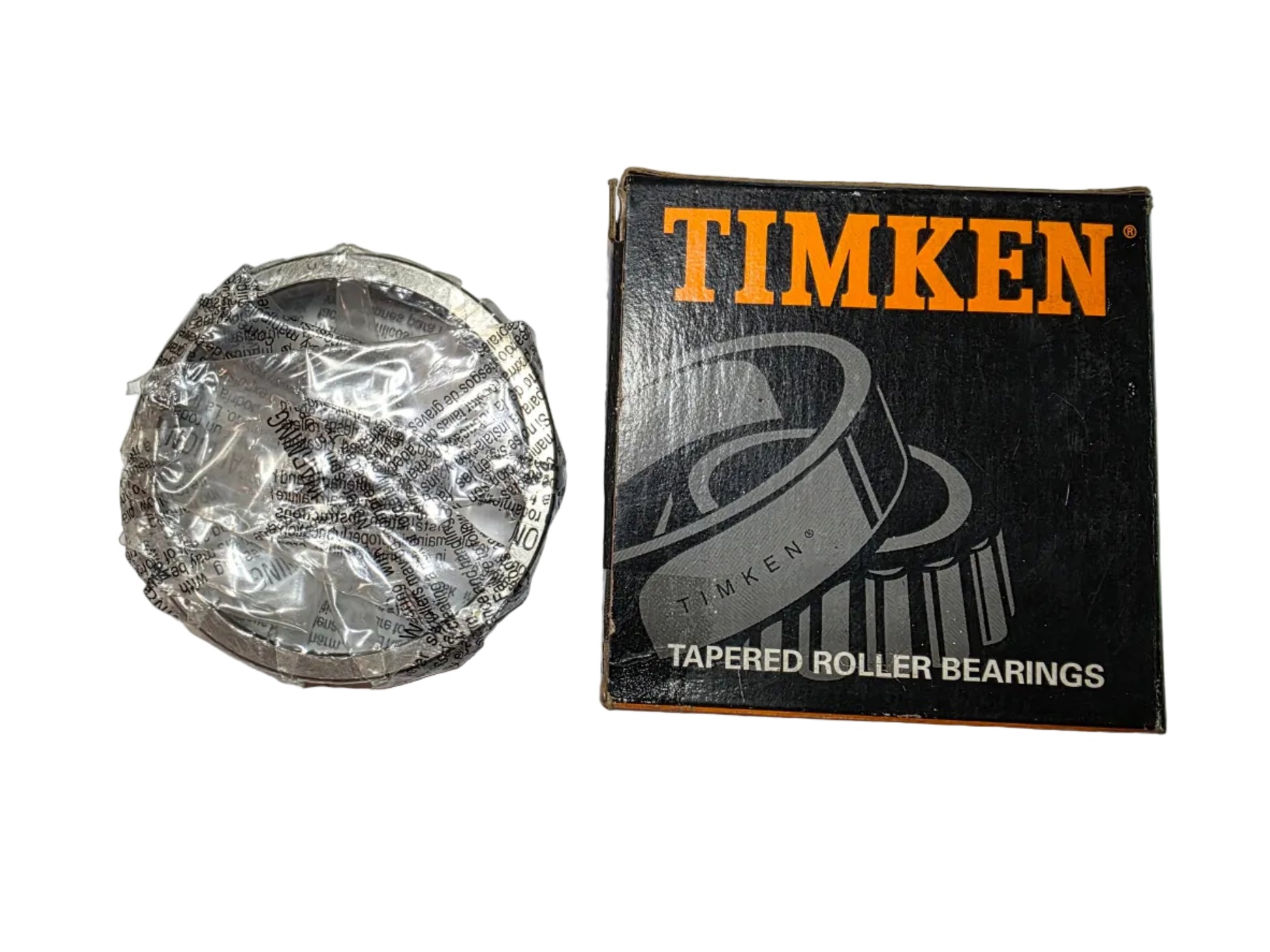 Timken tapered roller bearings with packaging on a textured surface