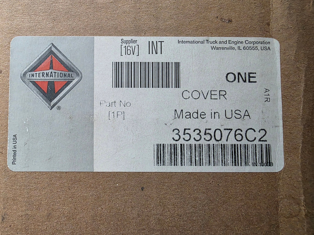 Label on a cardboard box with International Truck and Engine Corporation branding and product details.