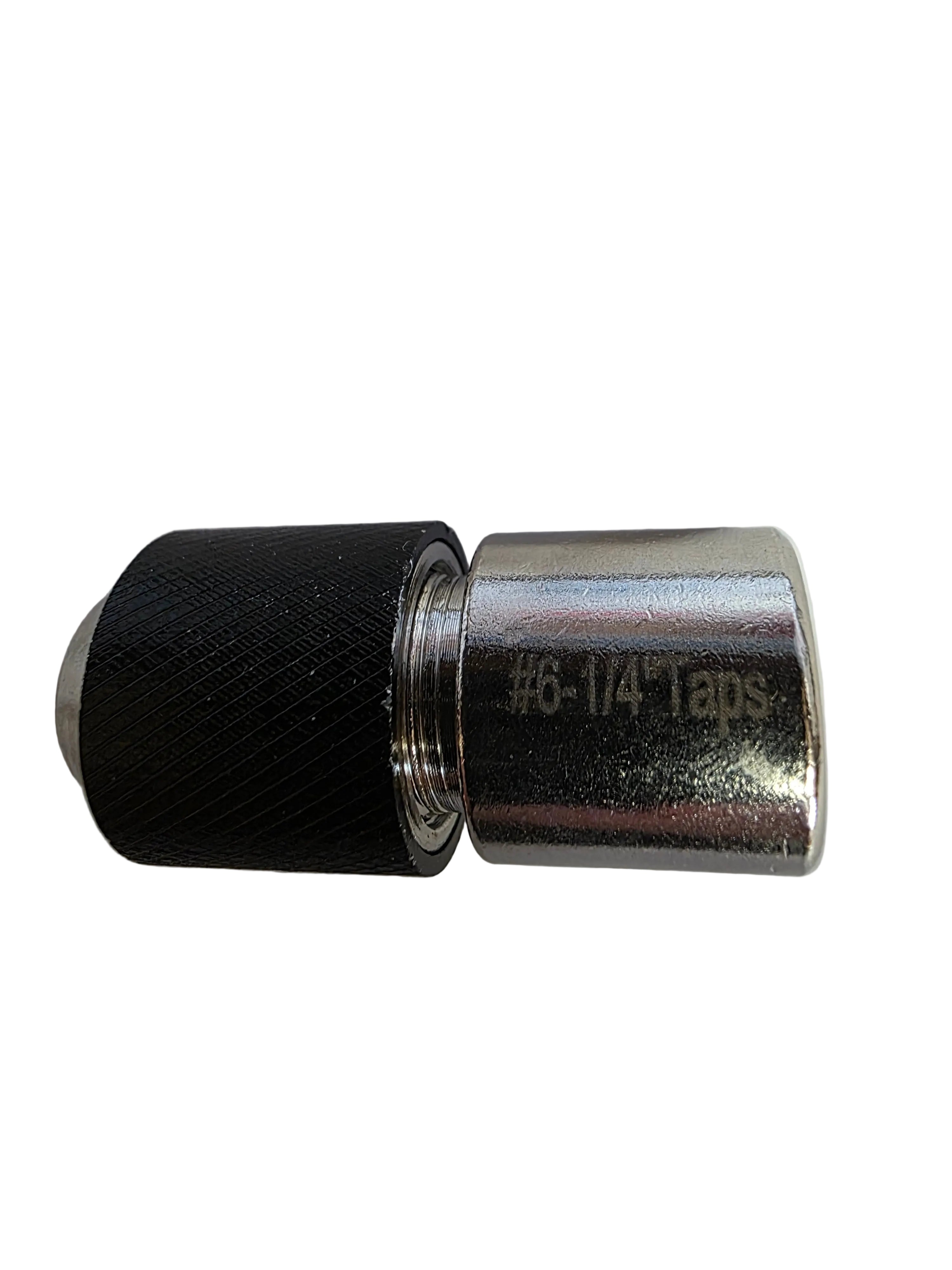 A metal tap adapter with a textured black knurled sleeve and a shiny silver chrome body, featuring the text '#6-1/4" Taps' printed on the side, set against a plain white background.