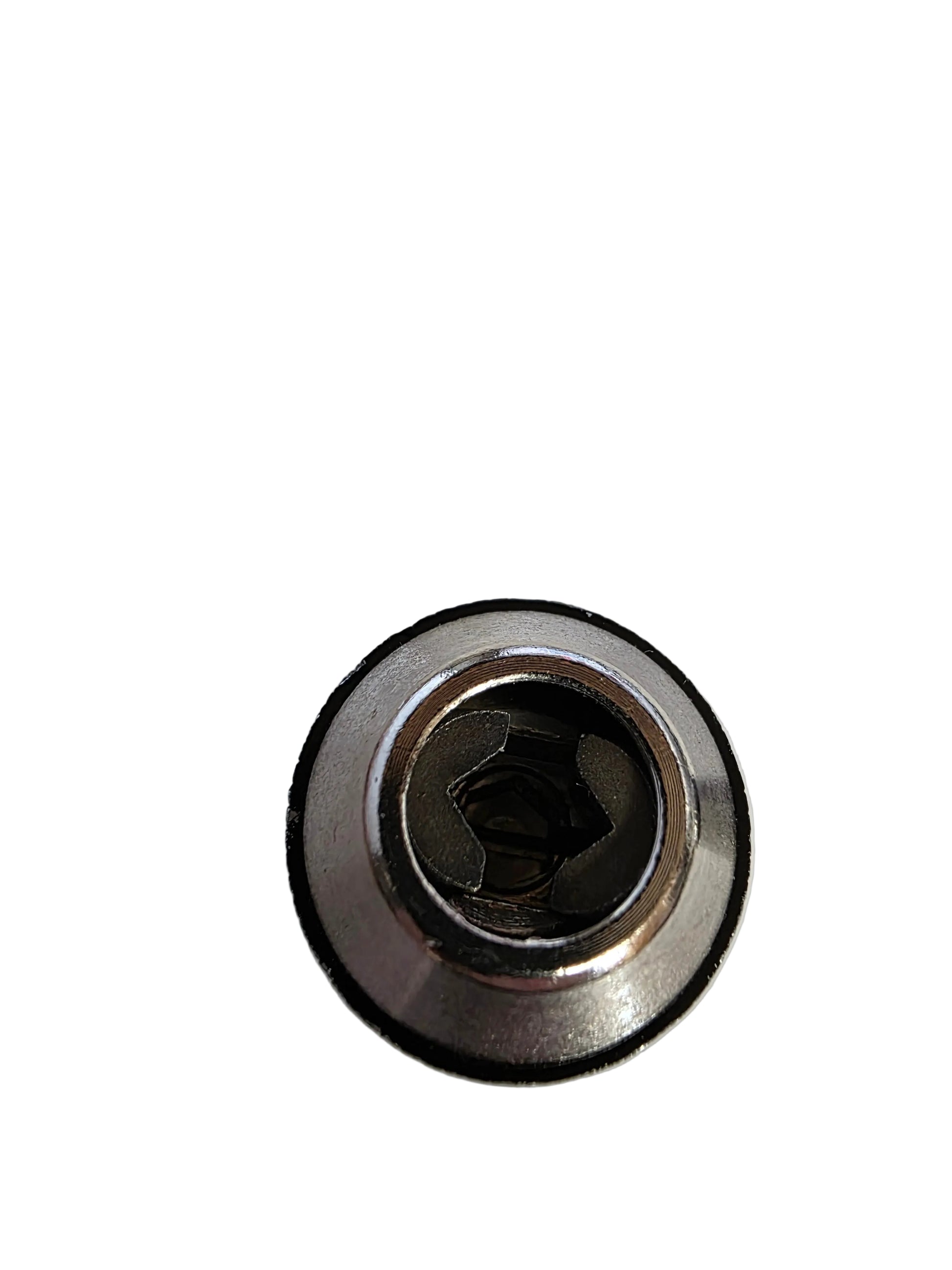 A close-up of a metallic hex socket or threaded component on a plain white background.