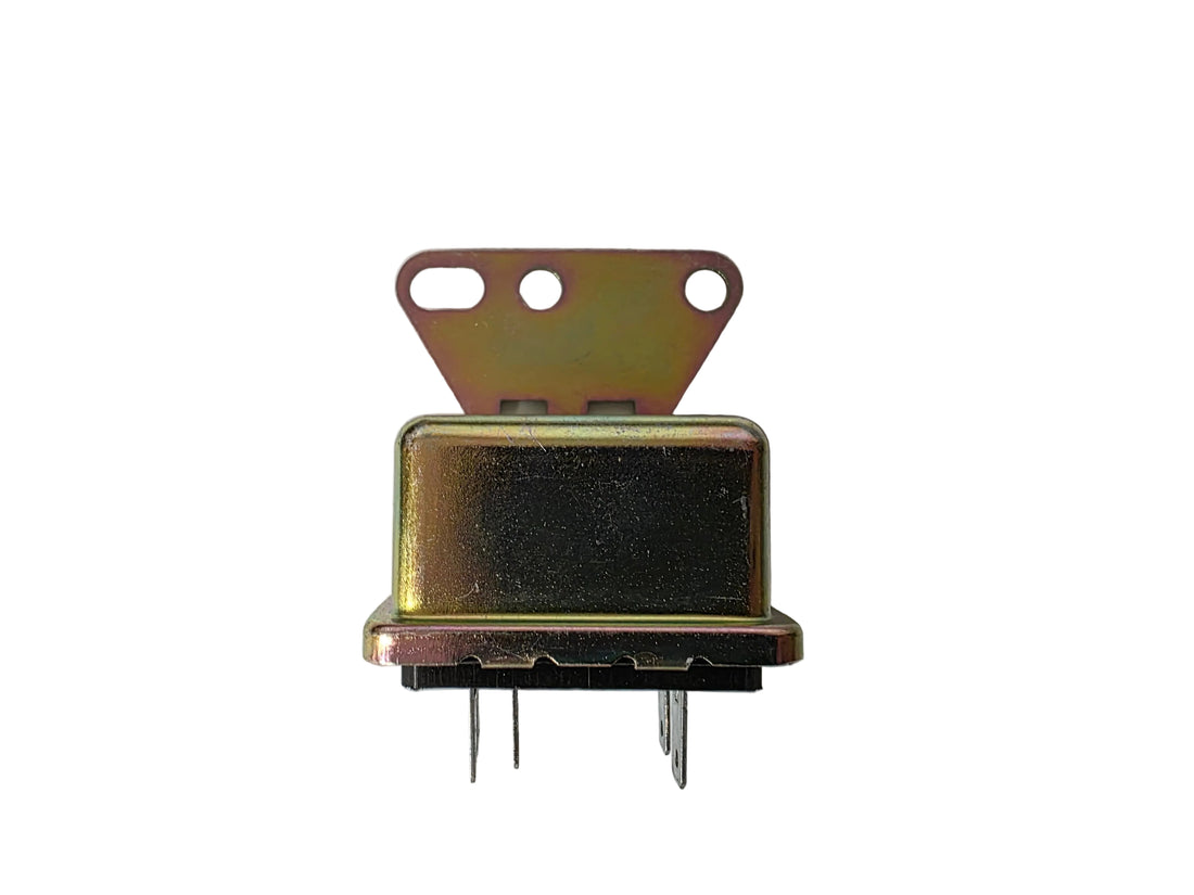 A vintage automotive relay next to its original paper packaging box. The box is gray with a white barcode label showing the brand 'International' and part number '447188C1'.