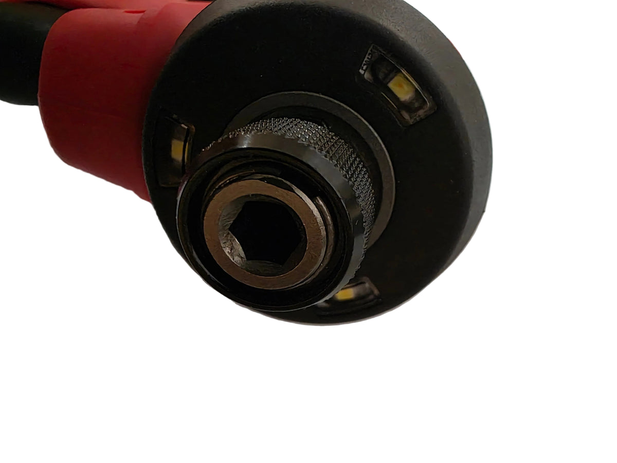  Milwaukee M12 FUEL 12V Subcompact Brushless 1/4" Hex Impact Driver (Bare Tool) 3453-20  with a hex socket center                                                                                               and 3 LED light indicators, resting on a white surface.