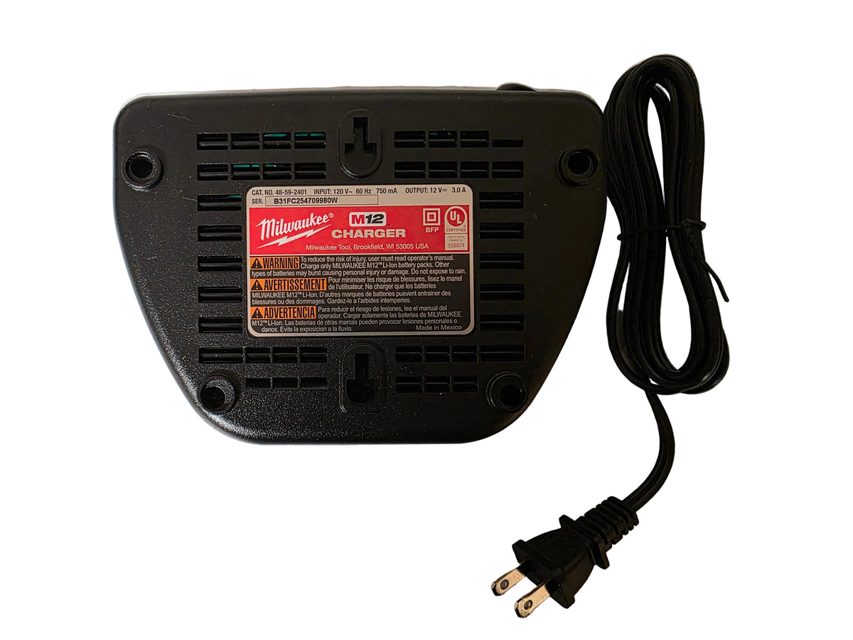 A black Milwaukee K12 V2 18V lithium-ion battery charger shown from the back, featuring a red and white product label, a black power cord with a two-prong plug, and a coiled black cable, all placed on a white surface.