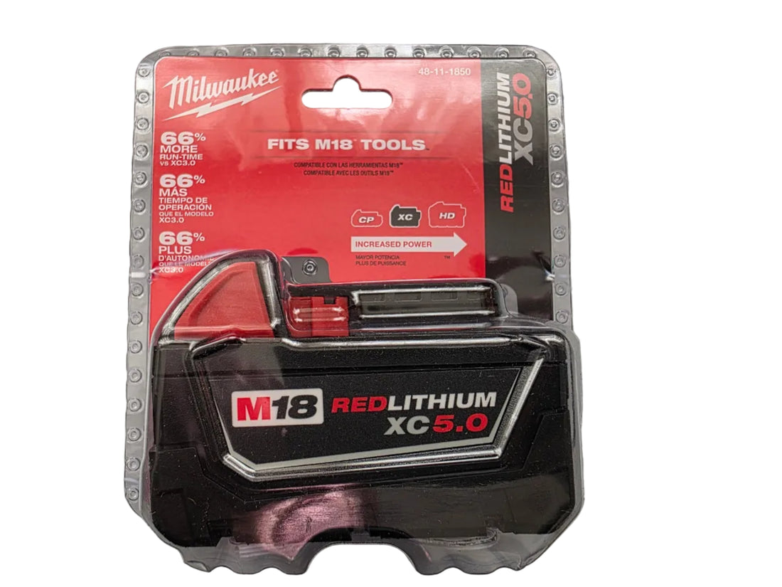 A M18 RED LITHIUM XC-5.0 cordless battery in its original clear plastic clamshell packaging, showing the black and red battery face.