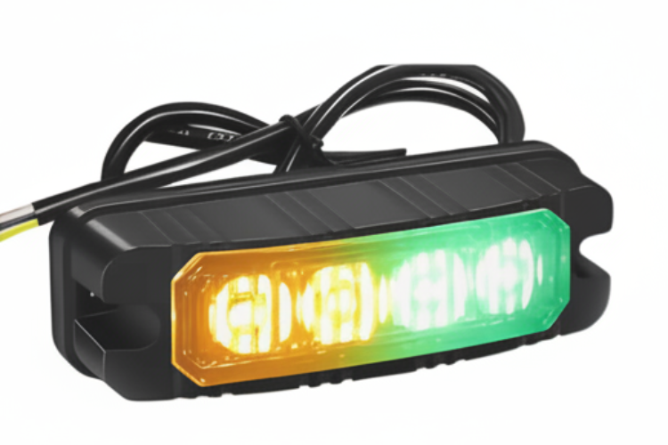 A black rectangular marine LED light with a dual-color amber and green light bar, shown on a solid white background.