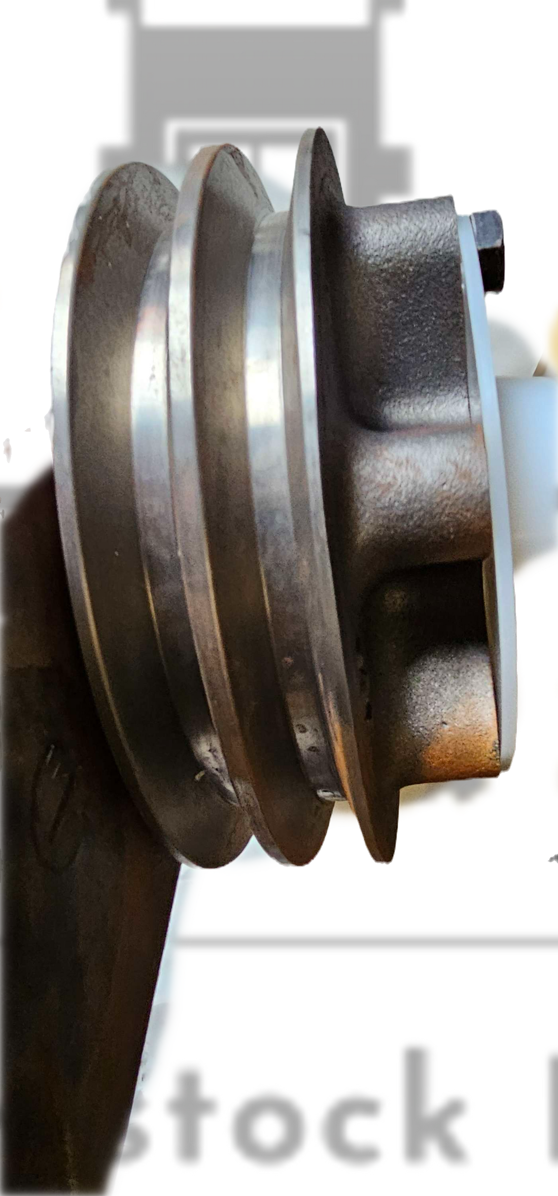 Metallic shaft with pulley on a white background