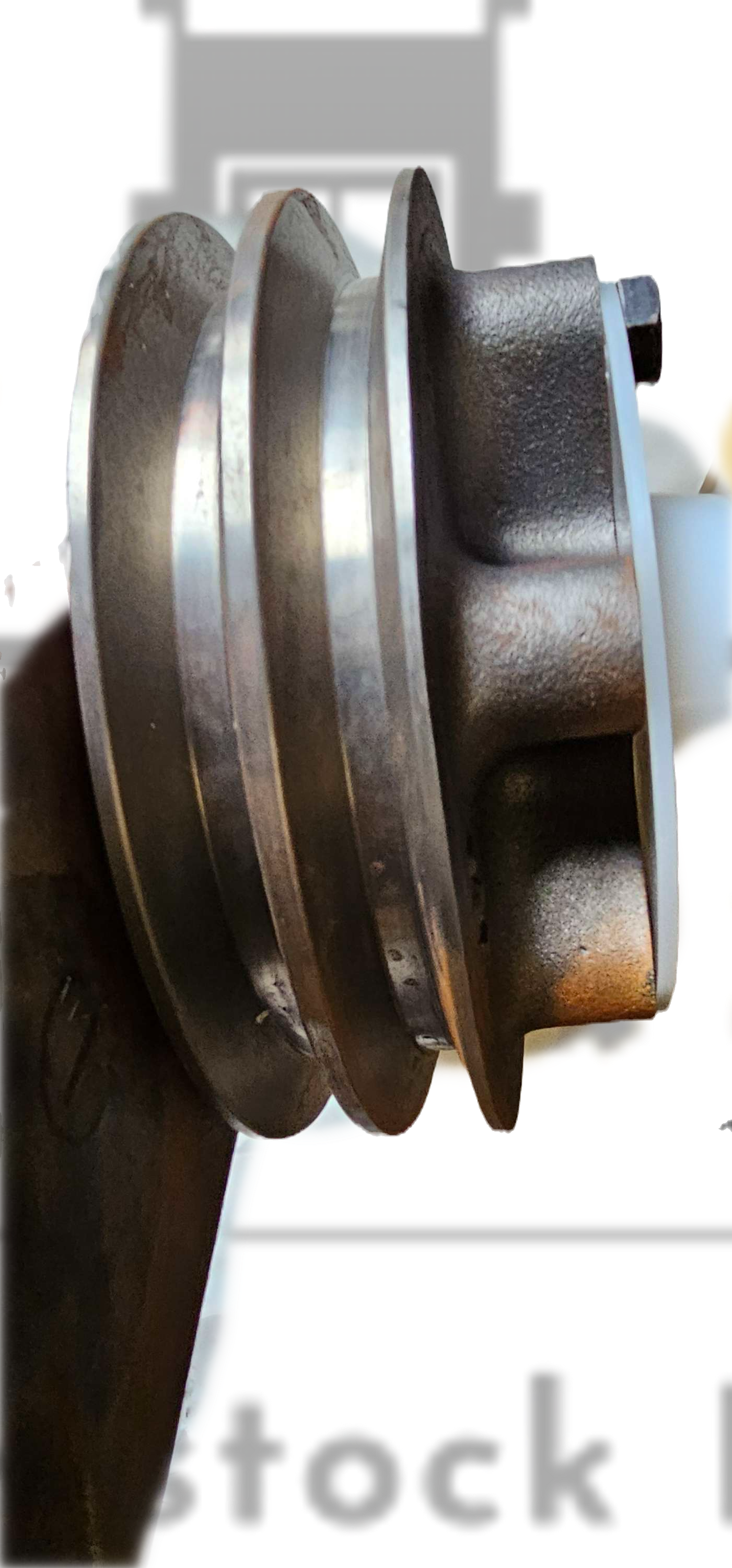 Metallic shaft with pulley on a white background