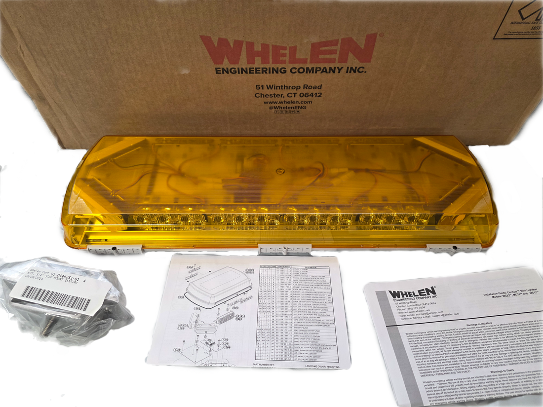 Yellow Whelen lightbar with packaging and documentation on a white background