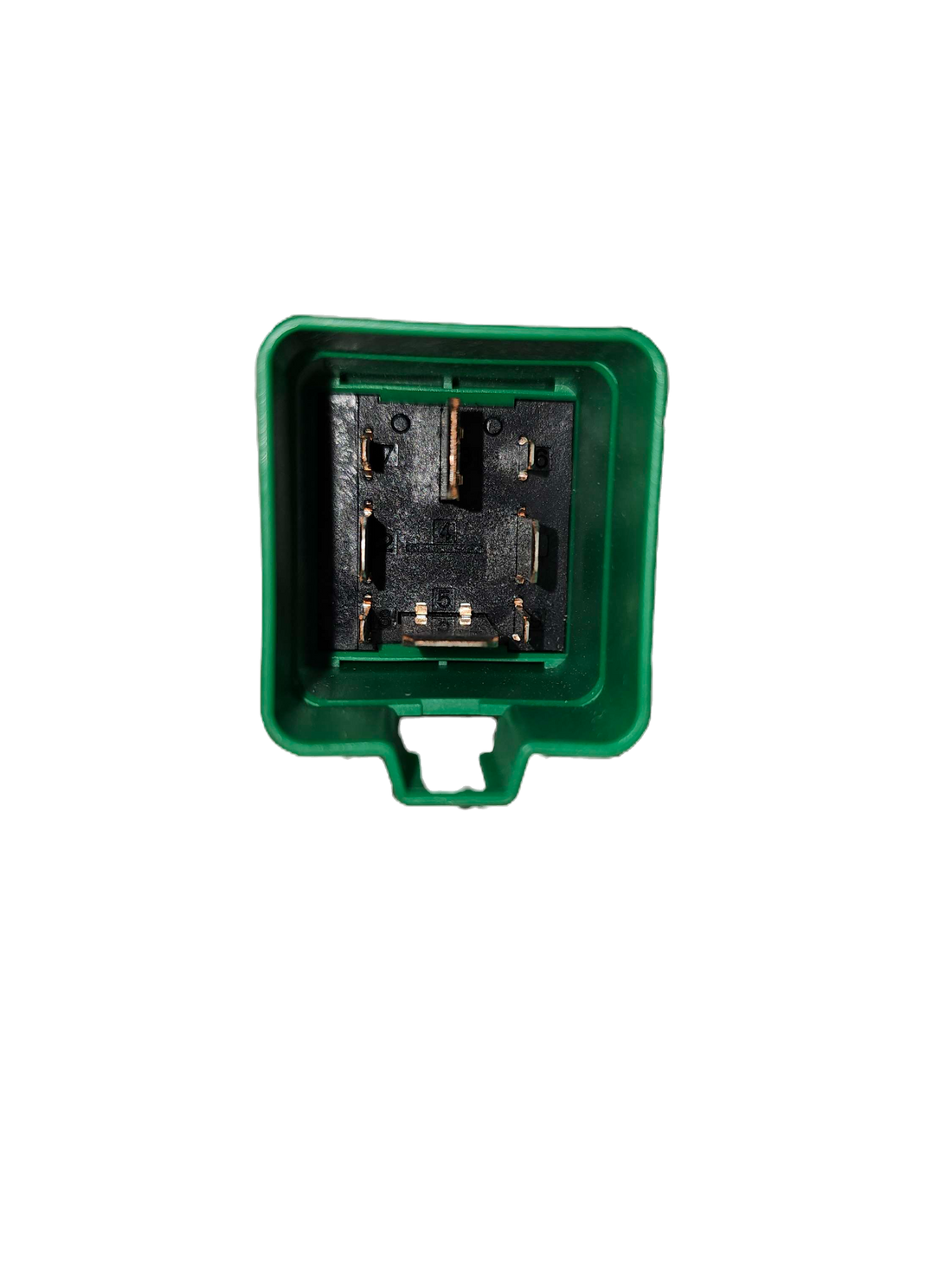 Green switch next to a plastic bag with automotive parts and a label.