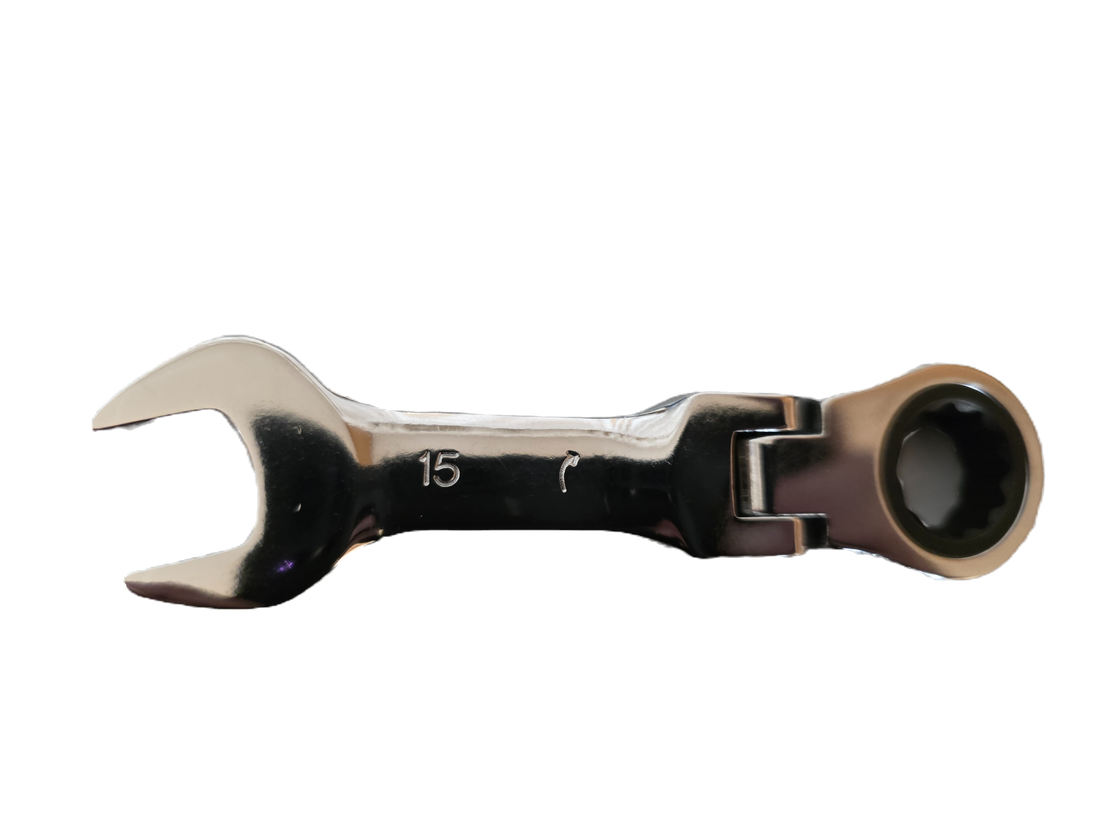 Set of wrenches in a blue roll-up tool bag on a white background