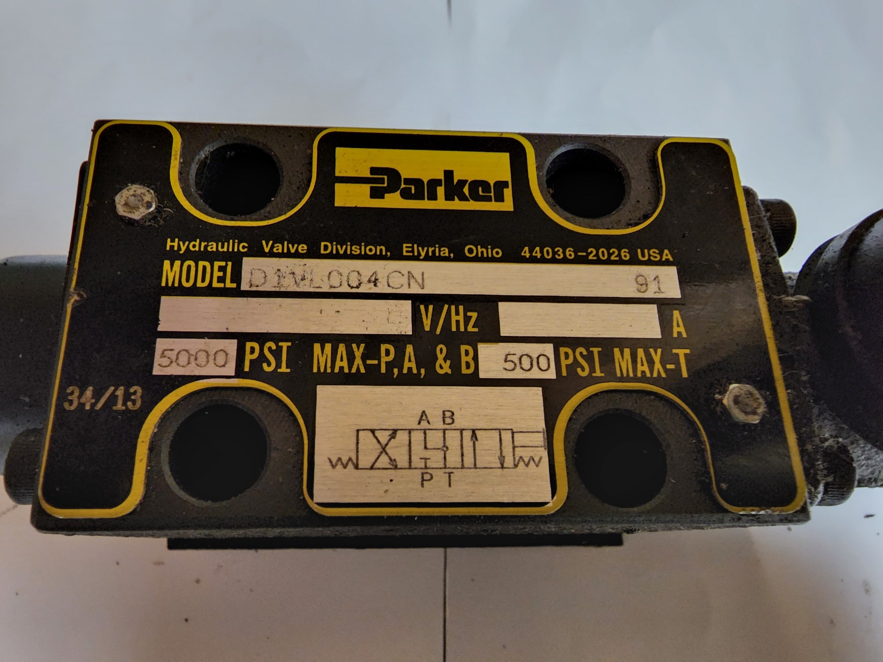 Parker hydraulic valve with model details on a white background