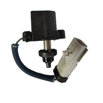 Black and beige mechanical component on a white background